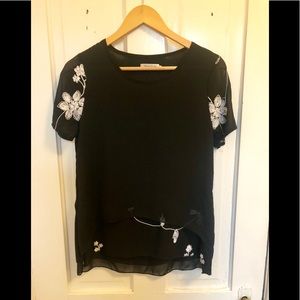 Black blouse with intricate details